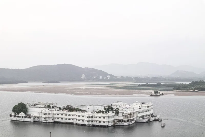 Palaces reflected in Lake Pichola at sunset, Udaipur