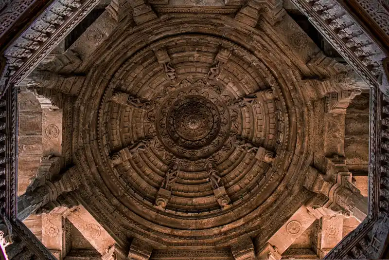 Carved marble pillars inside the Ranakpur Jain temple